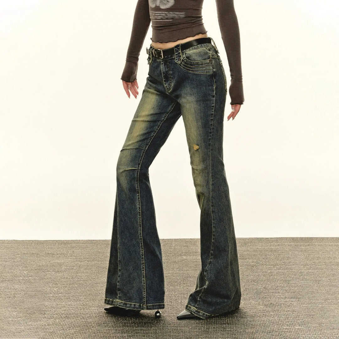 Classic Flared Denim Jeans with Decorative Stitching and Distressed Details