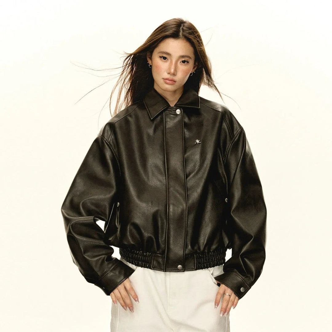 Classic Zippered Leather Jacket with Minimalist Detailing