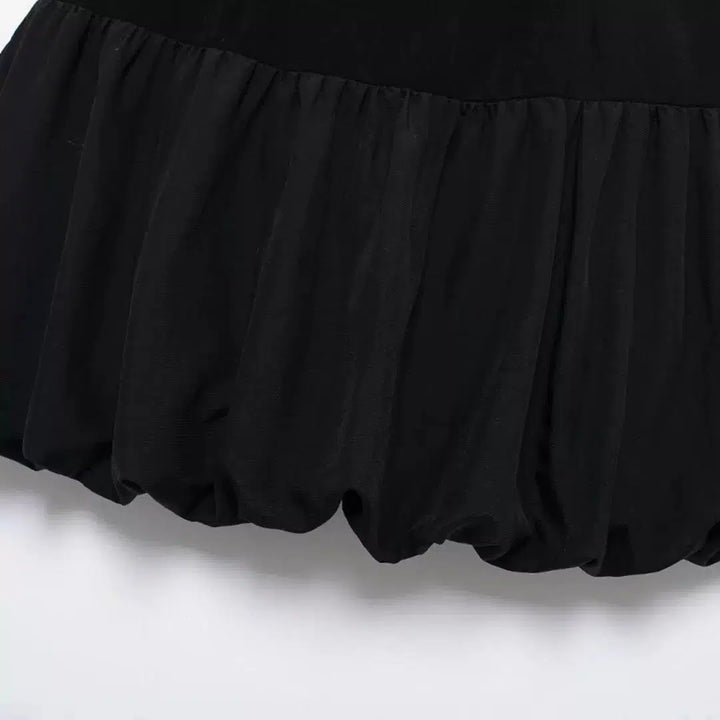 Double-Breasted Ruffled Mini Skirt