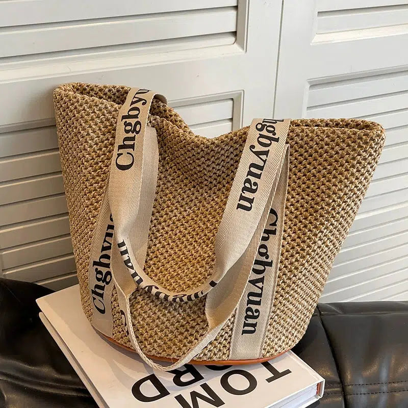 Logo Strap Handwoven Bucket Bag