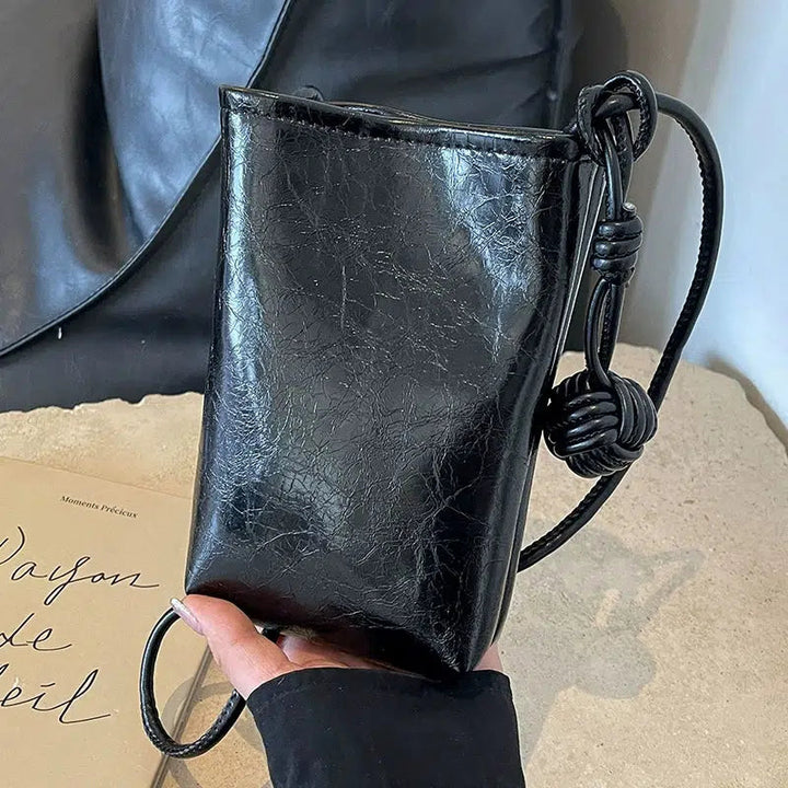 Metallic Knotted Mobile Phone Bag