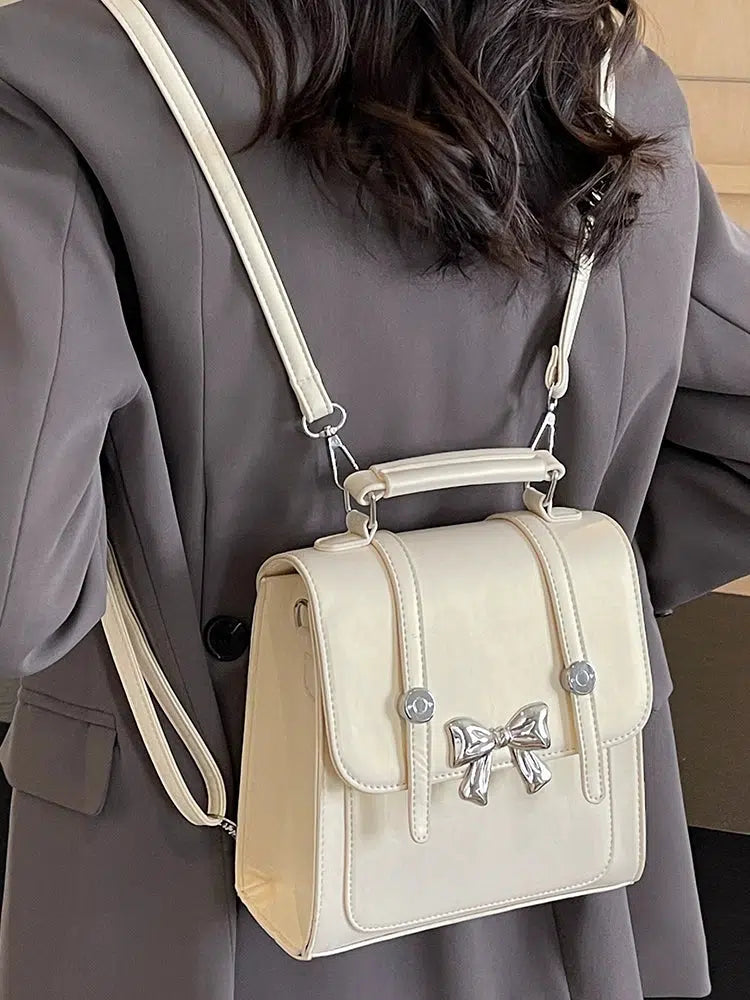 Top Handle Bow Accent Backpack