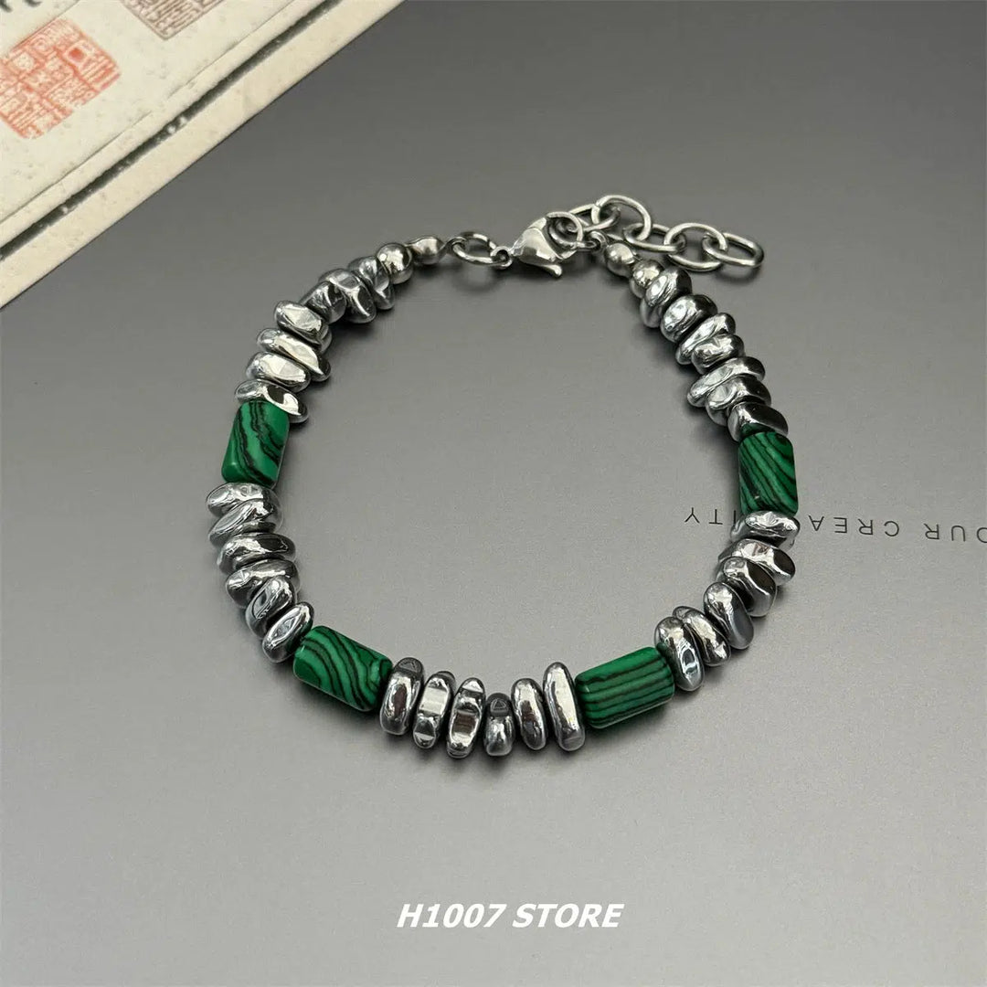 Silver Beaded Bracelet with Green Accents