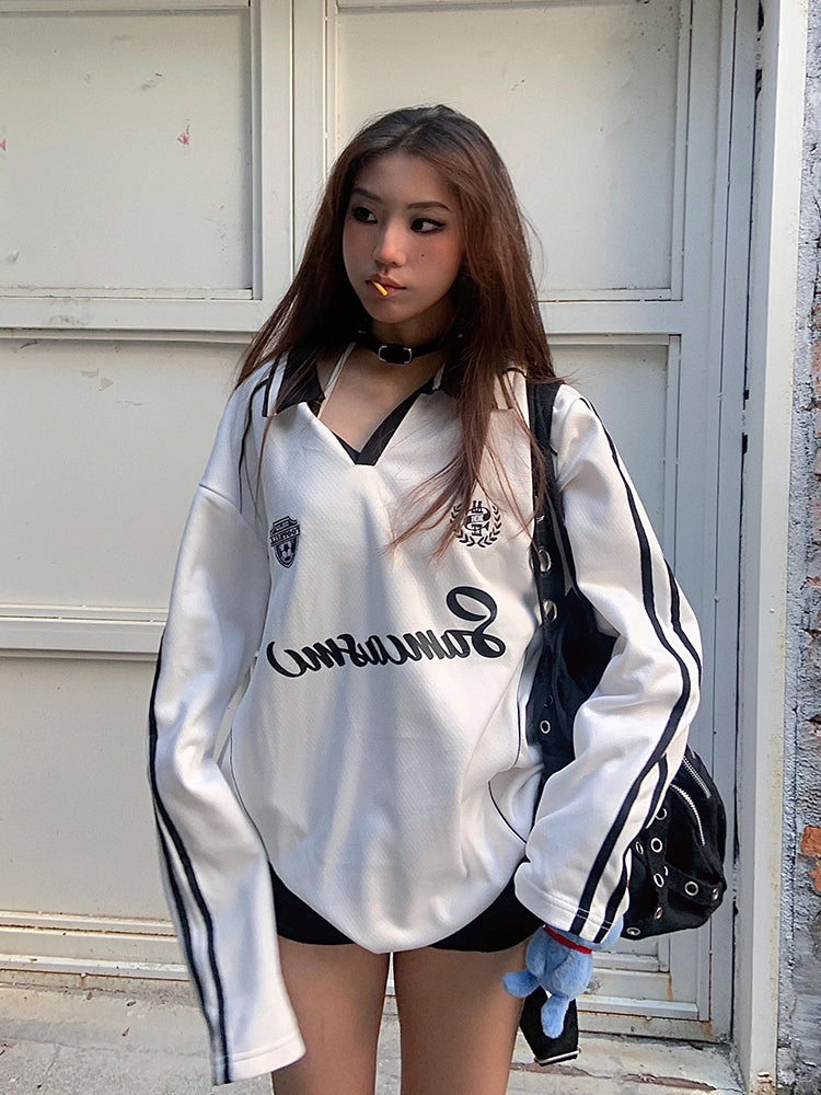 Jersey de manga larga oversized con cuello en V a rayas 