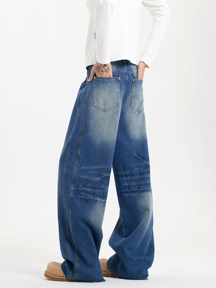 Loose Fit Deconstructed Jeans