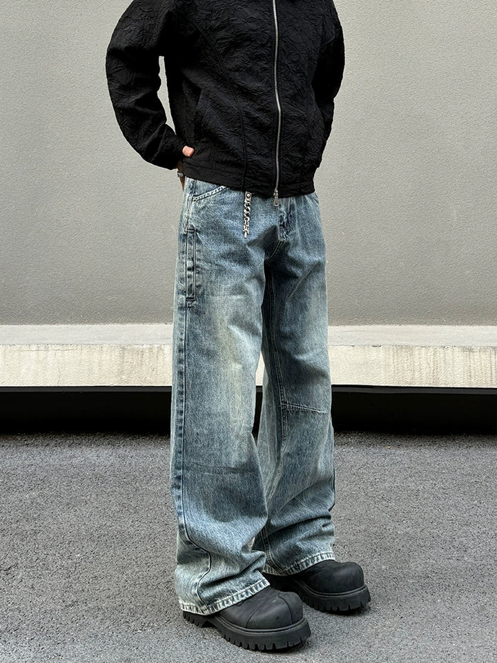 Distressed veckad avslappnad passform jeans 