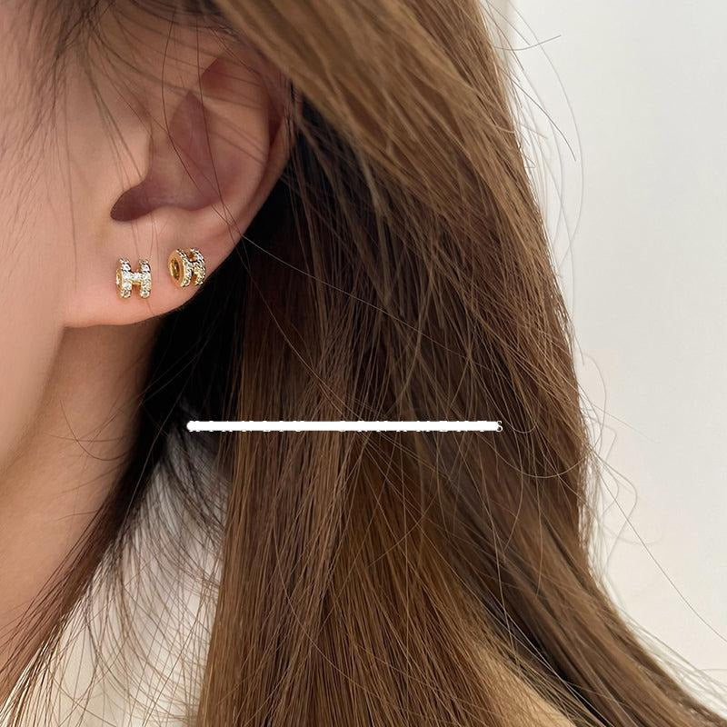 Zircon H Stud Earrings