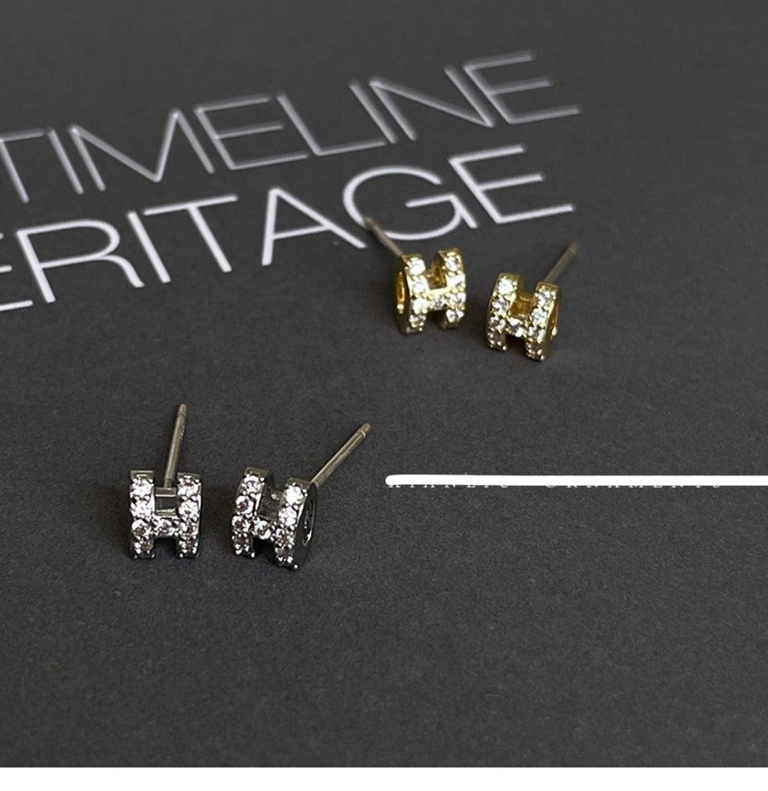 Zircon H Stud Earrings